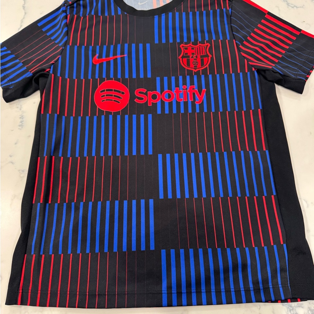 Nike Kids Black Jersey with Red and Blue Accents
